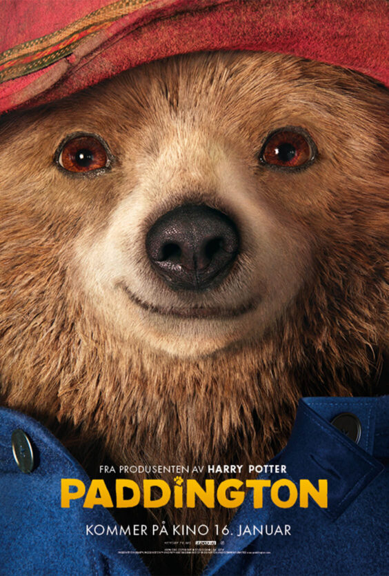 Paddington Nærbilde av en brun bjørn med rød hatt og blå jakke